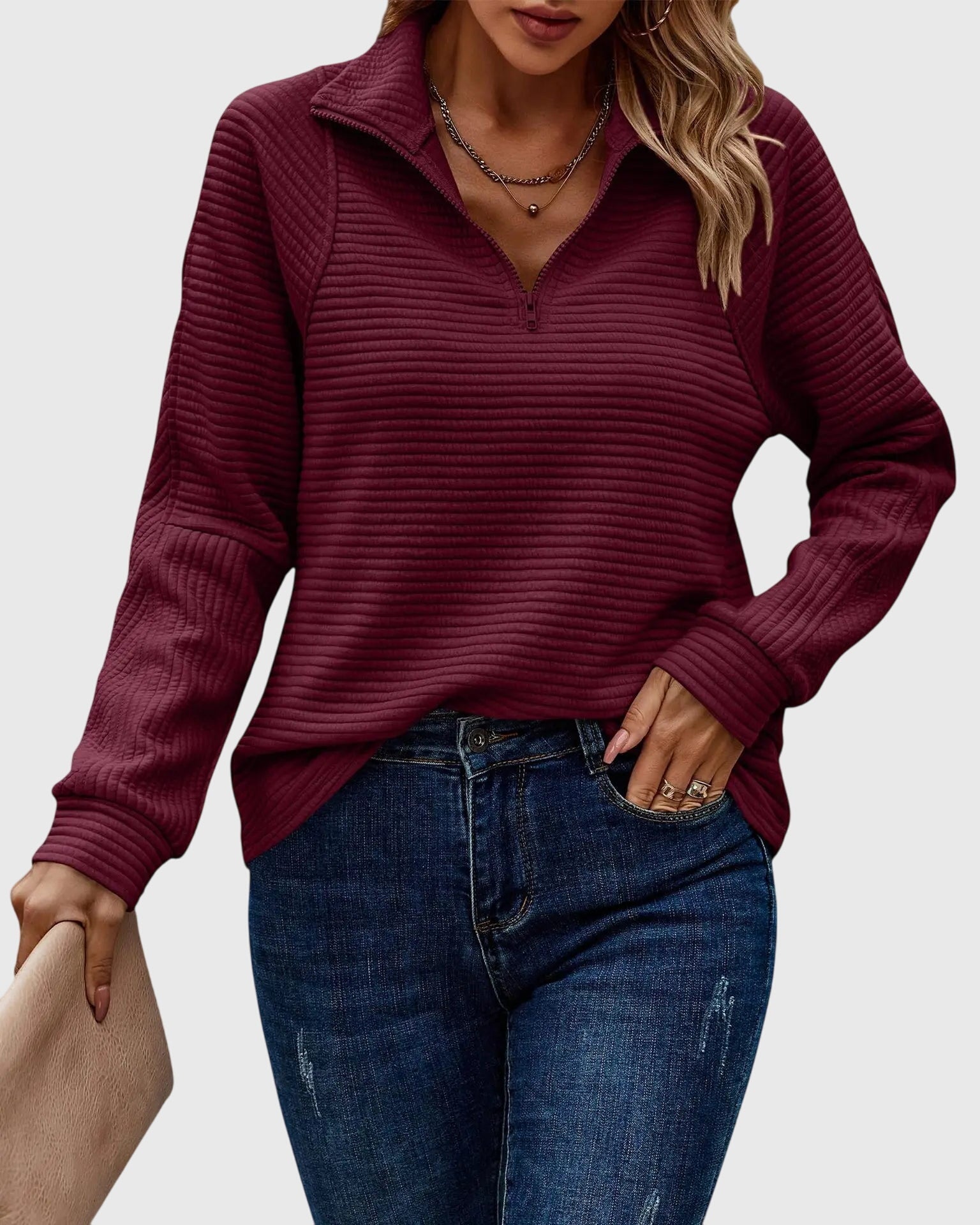 Women's elegant V-neck zipper sweater, long sleeve design. A stylish and versatile wardrobe addition.