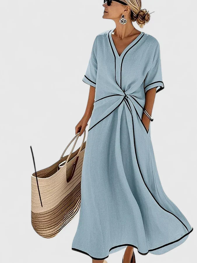 Relaxed fit women's striped summer dress. Flowy, lightweight, and perfect for everyday style or brunch on warm days.