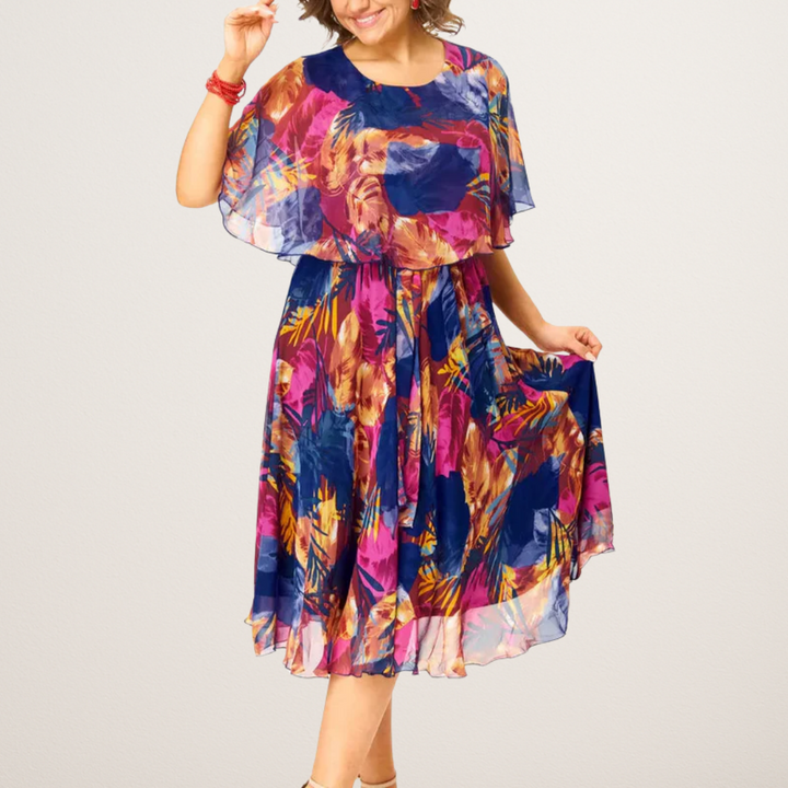 Chic A-line women's vibrant floral midi dress with long sleeves & v-neck. Elegant flowy style for spring/summer fashion.