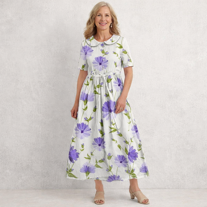 Elegant women's vintage floral maxi dress with Peter Pan collar and tie waist, perfect for summer garden parties.