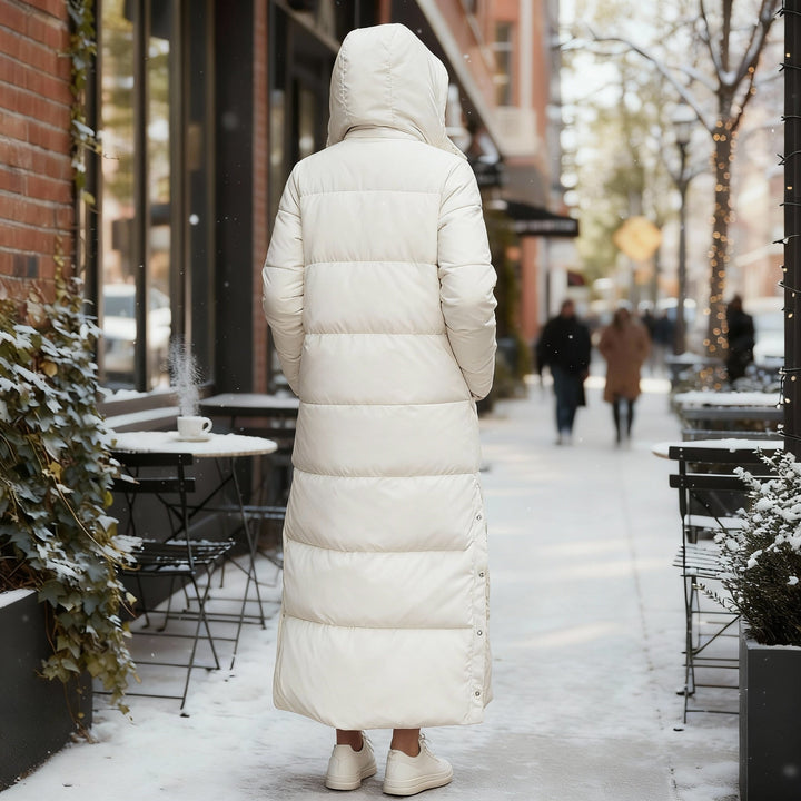 Cozy women's quilted winter coat, elegant long design for everyday style & cold weather layering.