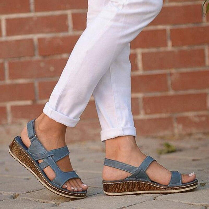 Comfortable women's wedge sandals, perfect for elegant summer style. Versatile footwear.