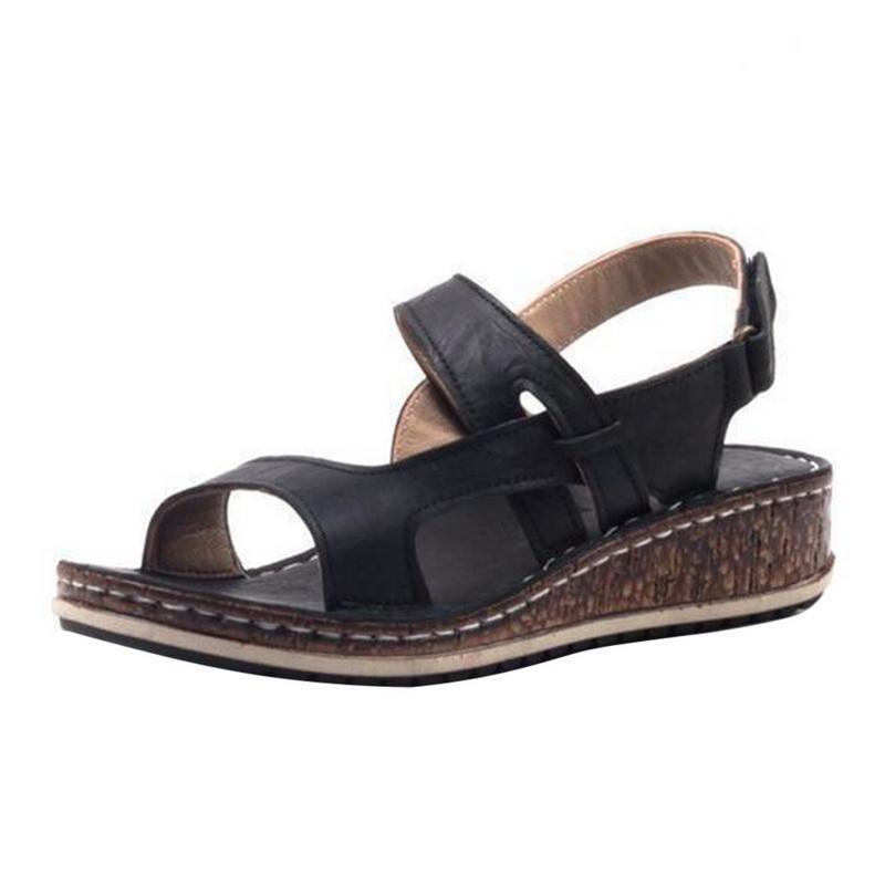 Blue stylish women's wedge sandals. Elegant and comfortable summer shoes for any event.