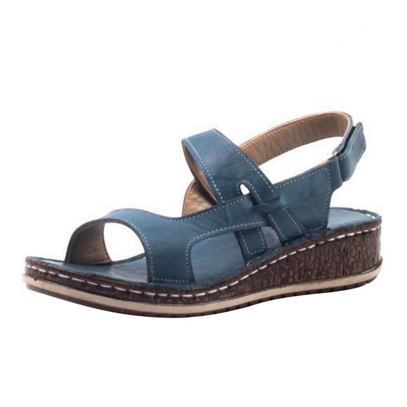 Chic women's wedge sandals. Elegant and comfortable summer footwear for stylish women.