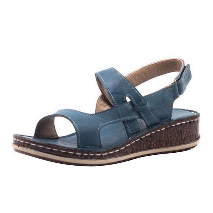Chic women's wedge sandals. Elegant and comfortable summer footwear for stylish women.