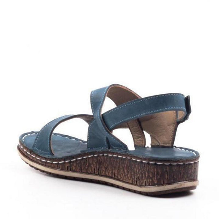 Fashionable women's wedge sandals, enhancing elegant summer style & comfort.