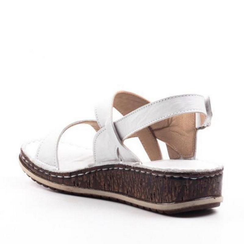 Elegant women's wedge sandals in black, blue, or white. Comfortable & stylish summer footwear.