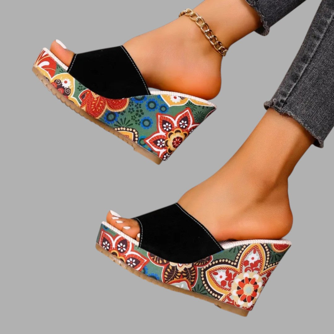Chic women's wedge sandals with elevated style, offering all-day comfort. Great for elegant summer outfits.
