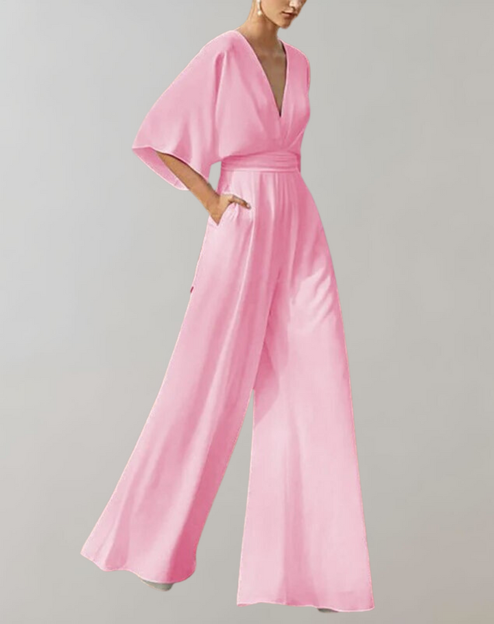Versatile women's elegant wide leg jumpsuit, perfect for evening events. Button front detail.