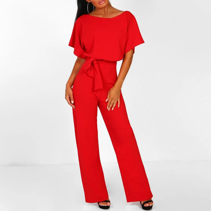 Stylish women's wide-leg jumpsuit, featuring a cinched belted waist for a modern and effortlessly chic silhouette.