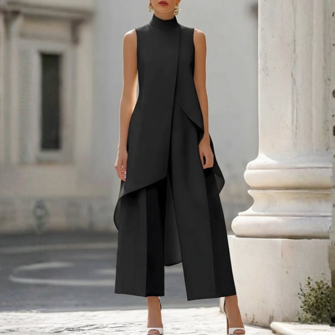 Versatile women's wide-leg jumpsuit. Features a stylish drop waist, high neck, and sleeveless design for chic fashion.