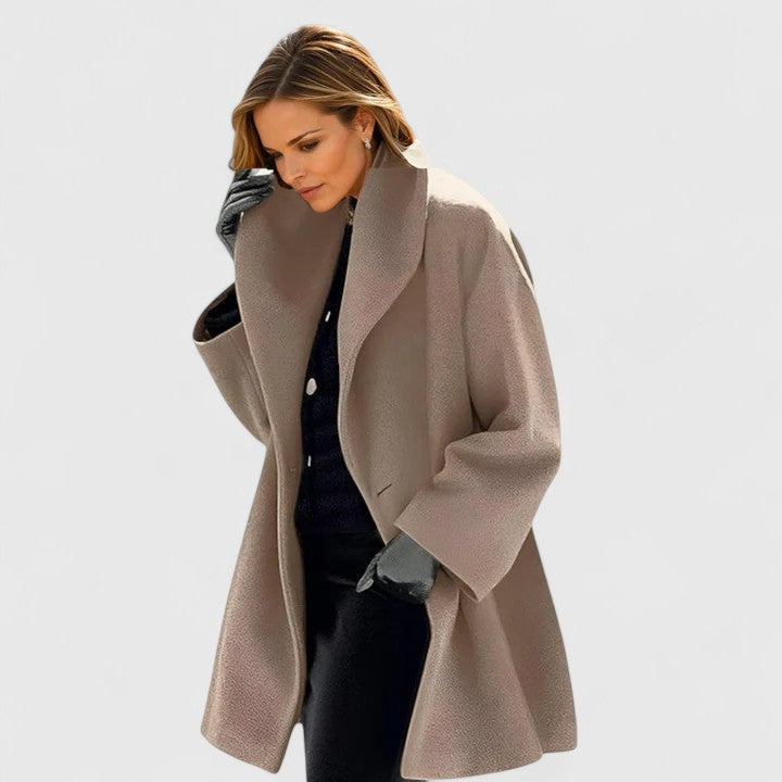 Stylish women's winter coat, elegant minimalist design offers comfortable, versatile warmth.