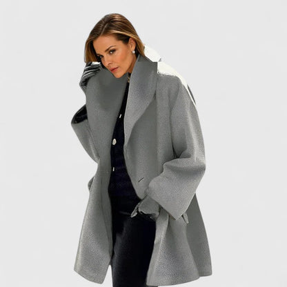 Women's elegant longline coat. A warm, chic fall essential for timeless winter fashion & comfort.