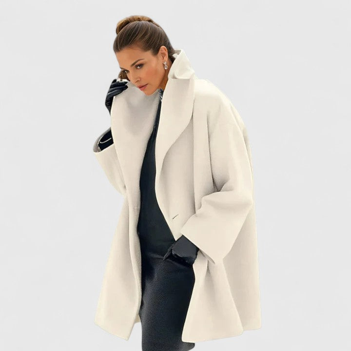 Timeless elegant women's winter outerwear. Longline coat for chic style, warmth & versatile seasonal fashion.