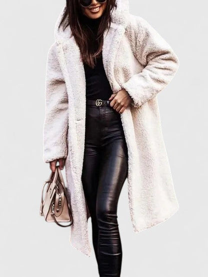 Stylish women's winter coat, offering elegant outerwear and cozy warmth for cold days.