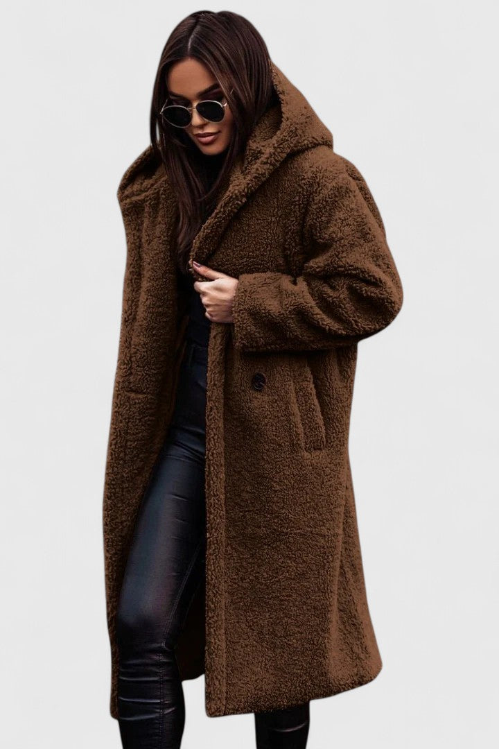 Cozy women's elegant winter coat, designed as warm outerwear for versatile everyday fashion.