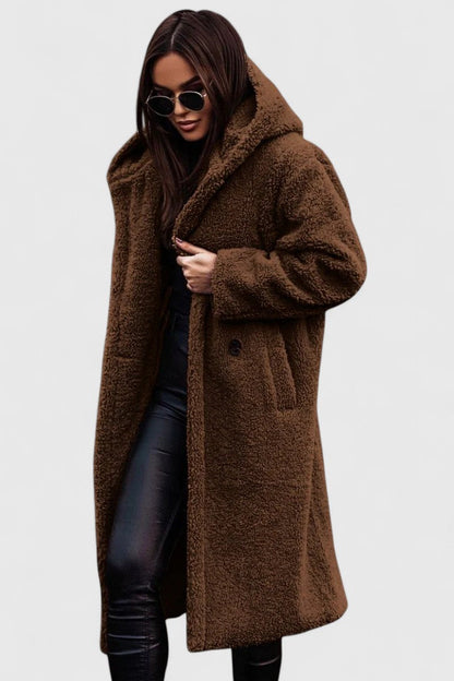 Cozy women's elegant winter coat, designed as warm outerwear for versatile everyday fashion.