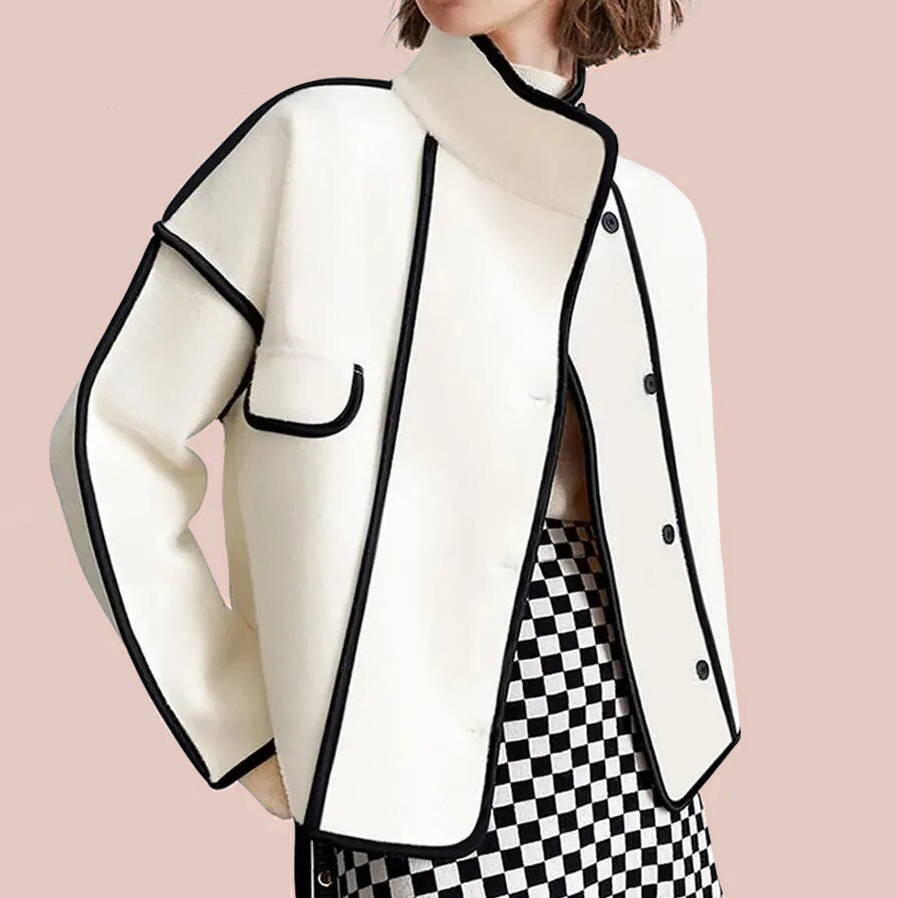 Elegant women's winter jacket with sophisticated contrast piping. Insulated for chic warmth in cold weather.