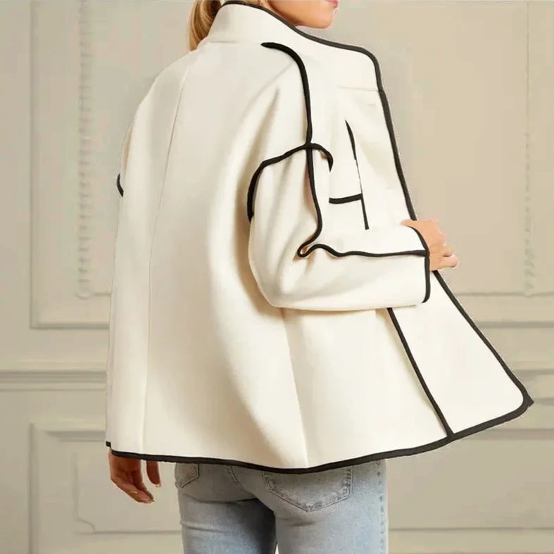 Luxury women's insulated winter outerwear. Elegant design with stylish contrast piping for winter fashion.