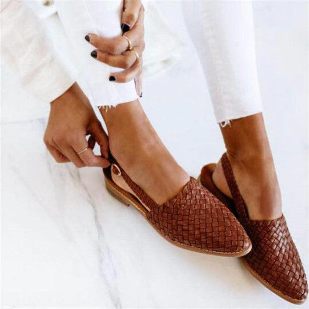 Elegant women's woven pointed-toe slip-on mules in a chic loafer style, perfect for versatile daily wear.