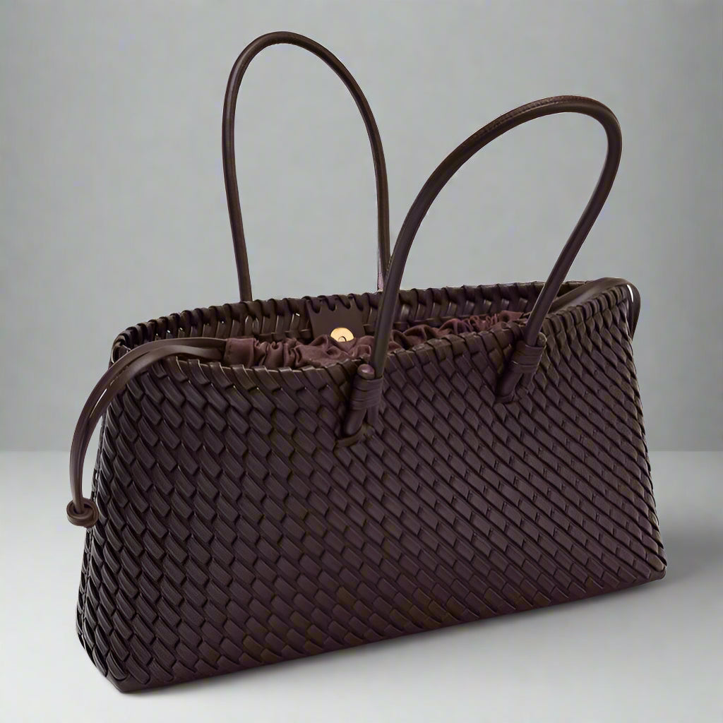Stylish women's woven handbag, a versatile accessory for organized and elegant everyday carry.