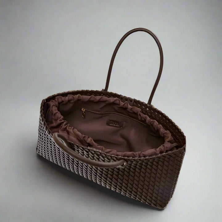 Beautiful women's woven tote bag, a timeless and elegant accessory for stylish women.