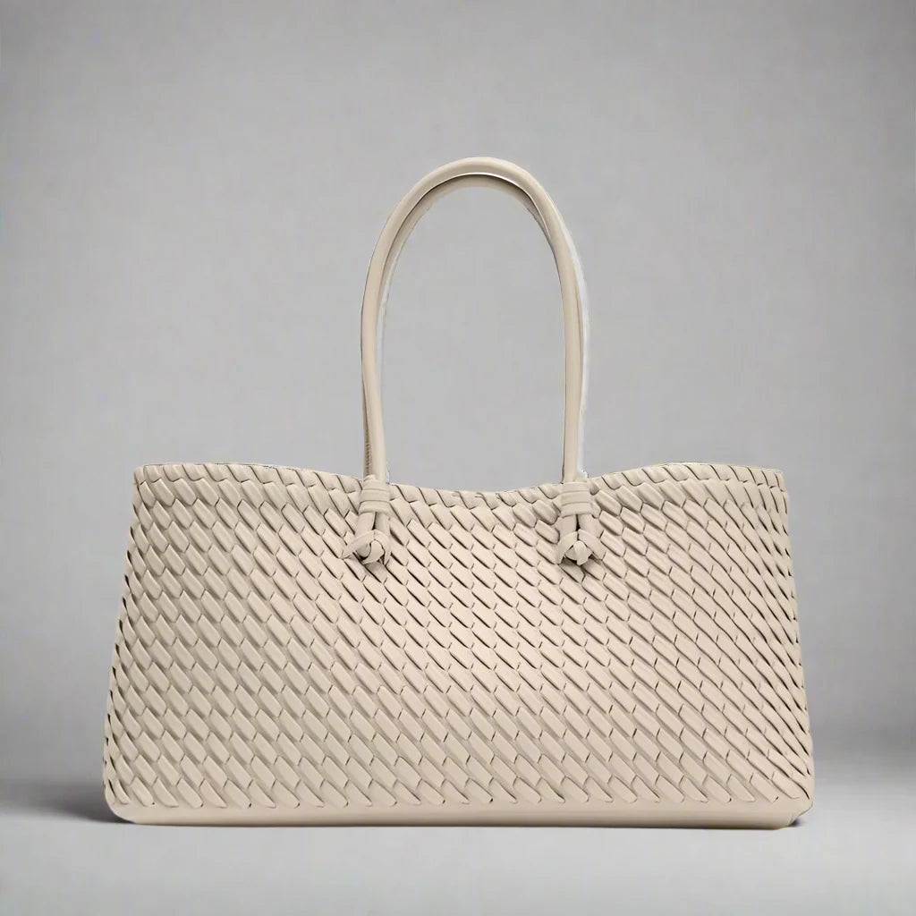 Sophisticated women's woven shoulder bag, an elegant accessory for a polished and chic ensemble.