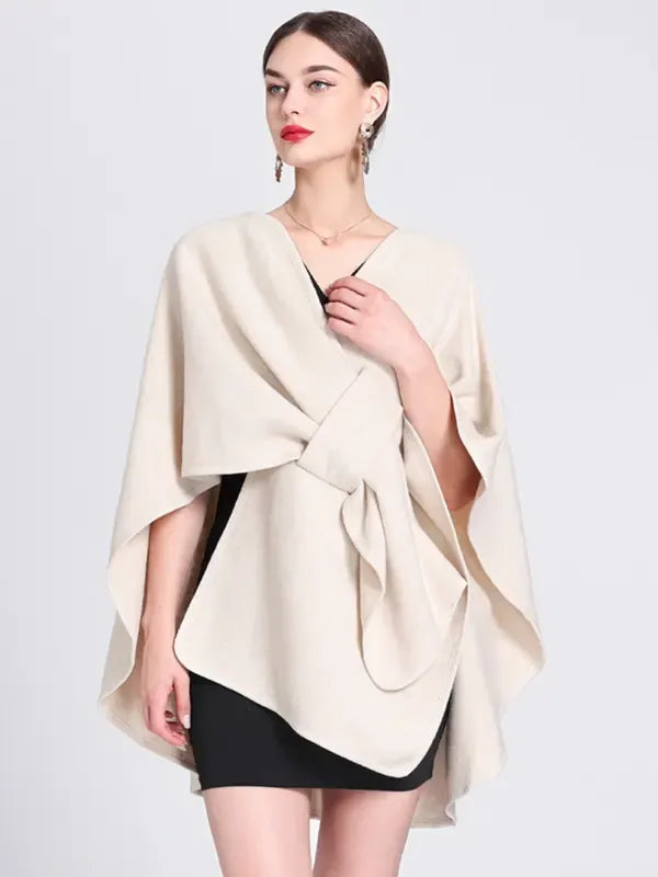Elegant women's wrap cape top with tie front for a modern, versatile look; perfect for smart casual or professional wear.