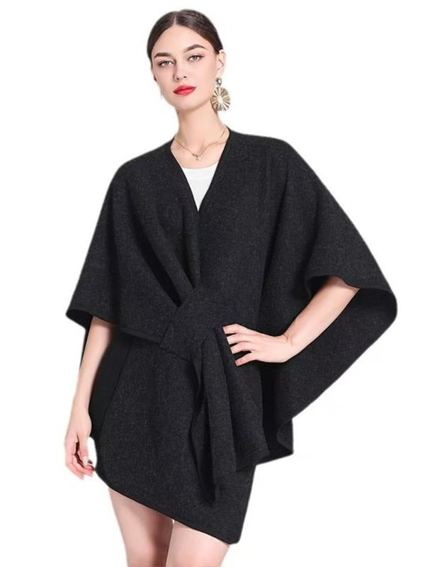 Chic women's modern cape blouse, versatile for layered or professional outfits; sophisticated wrap design.