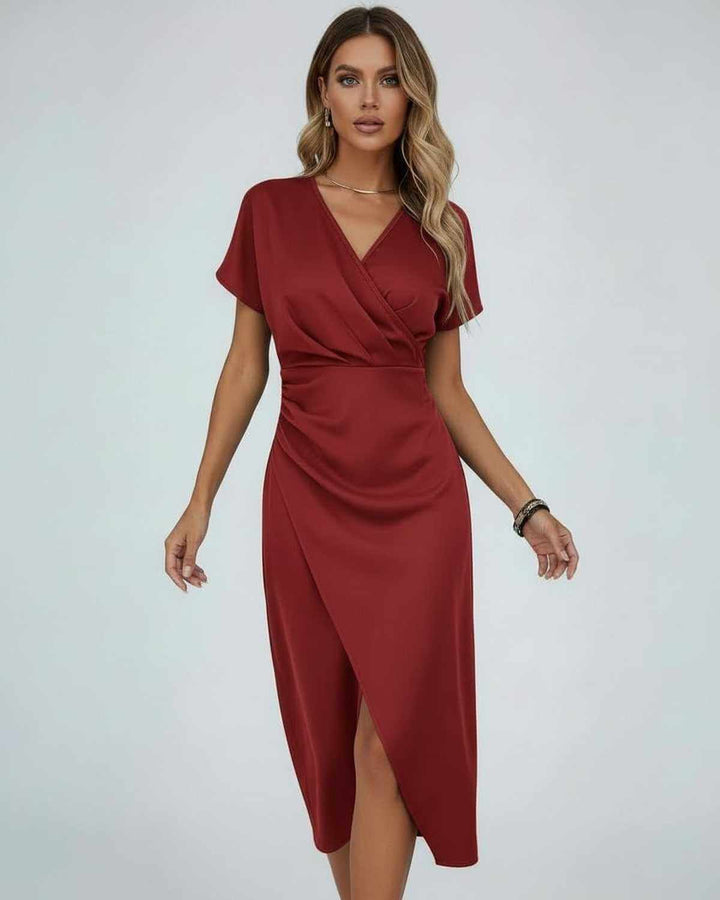 Flattering women's wrap midi dress. Elegant design with a V-neck, short sleeves & stylish split hem. Ideal for any occasion.