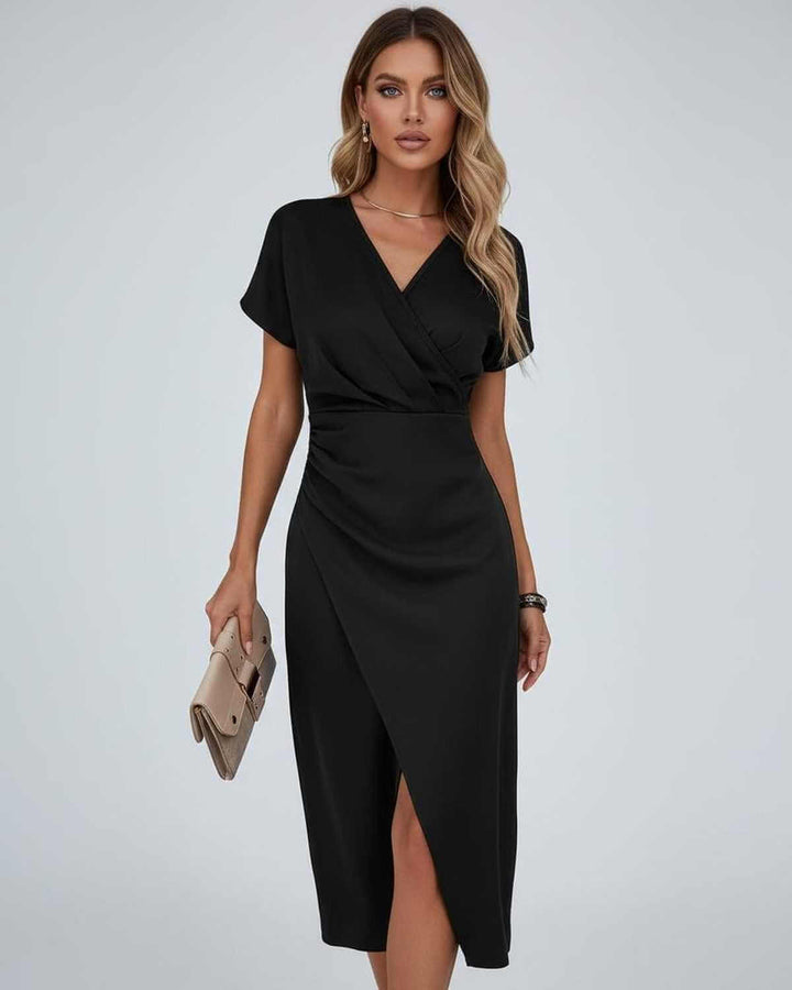 Chic women's elegant wrap midi dress. Features a V-neck, short sleeves & graceful split hem. A flattering and versatile fashion choice.