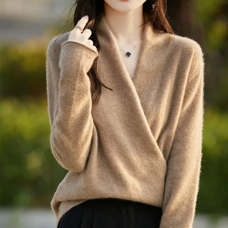 Chic women's V-neck wrap sweater. Modern, elegant, and soft comfort for all-day wear.