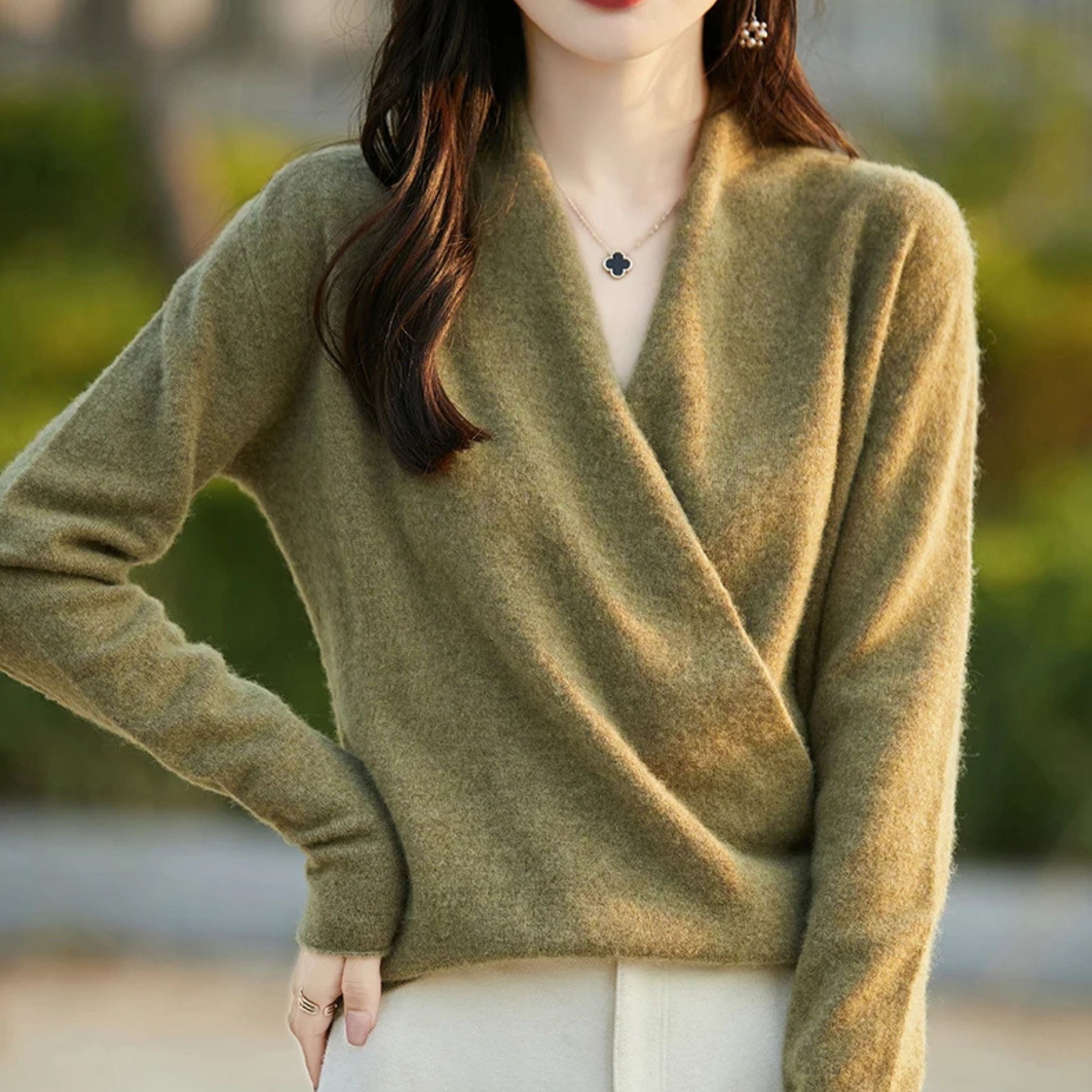 Women's elegant V-neck wrap sweater, a modern and comfortable fall/winter top.