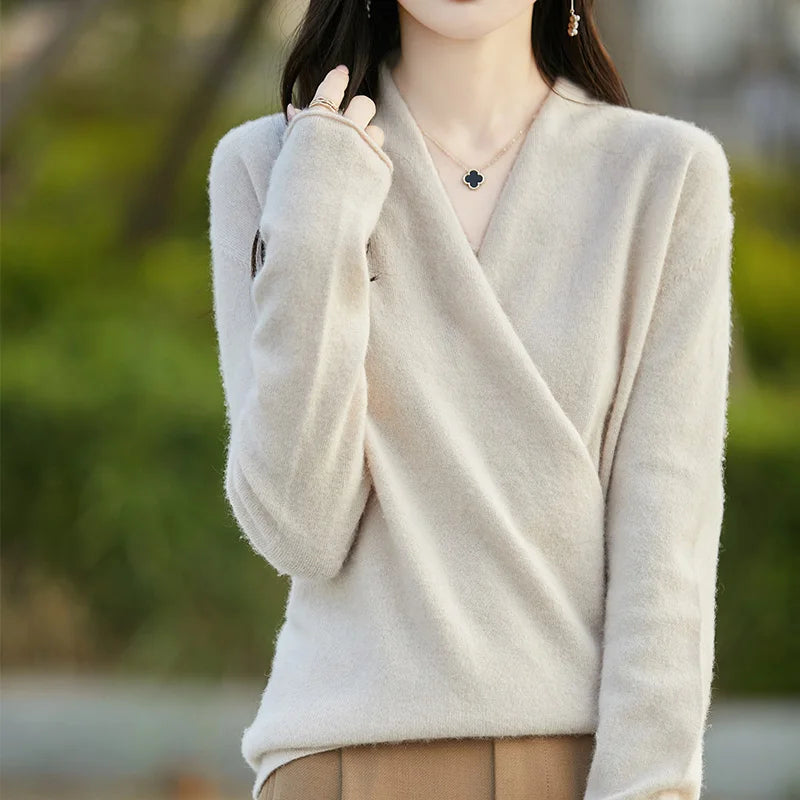 Modern V-neck women's sweater, an elegant wrap top for chic fall and winter wear.