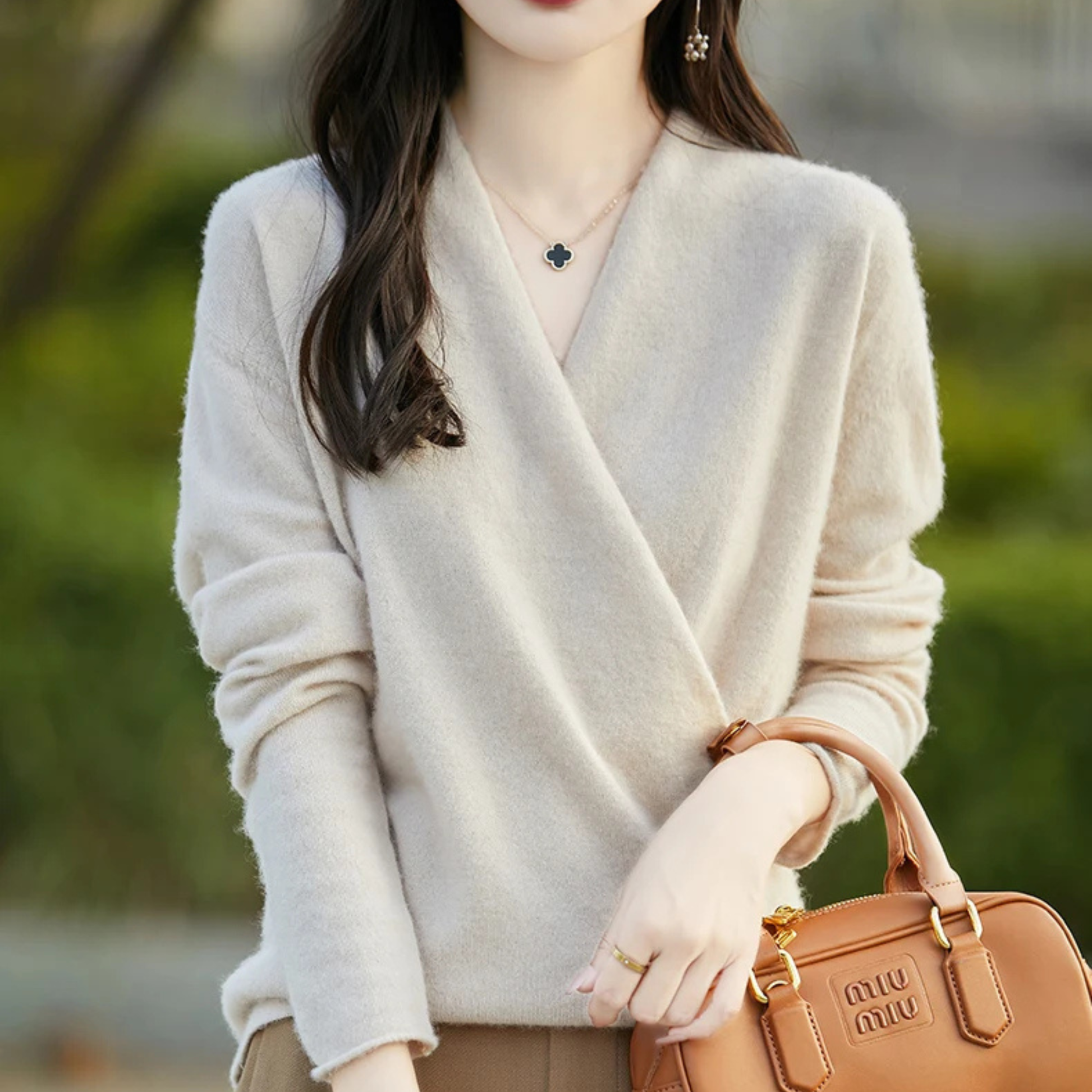Elegant women's V-neck wrap sweater for modern style, soft comfort & versatile layering.