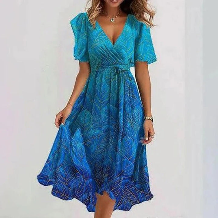 Romantic women's flutter sleeve V-neck midi dress, a flowing wrap design perfect for garden parties.