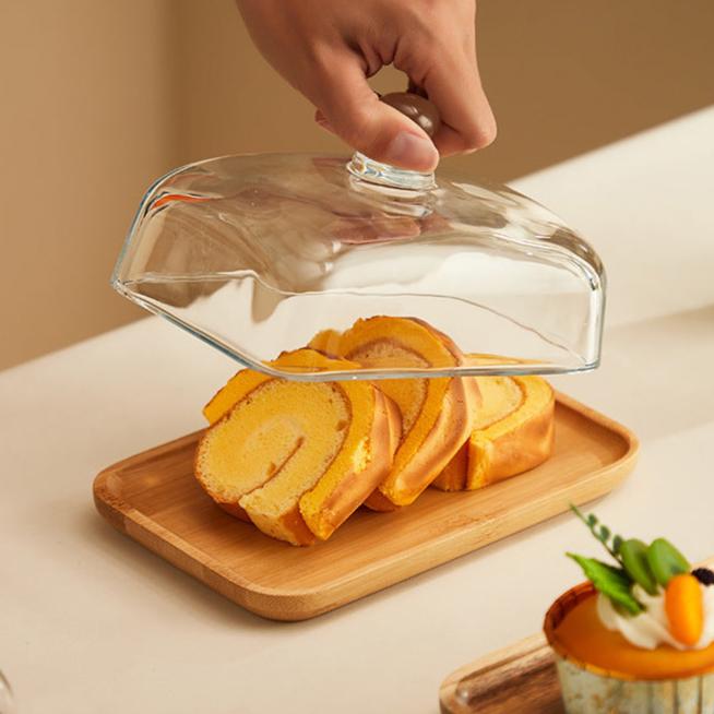 Elegant wood & glass butter dish for kitchen countertop serving and dining.