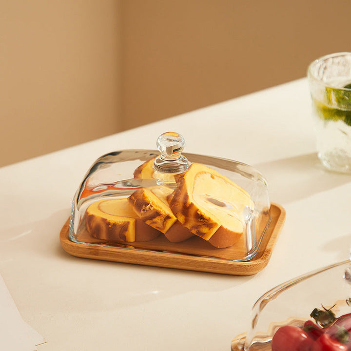 Keep butter fresh: elegant wood & glass butter dish for efficient kitchen food storage & attractive display.