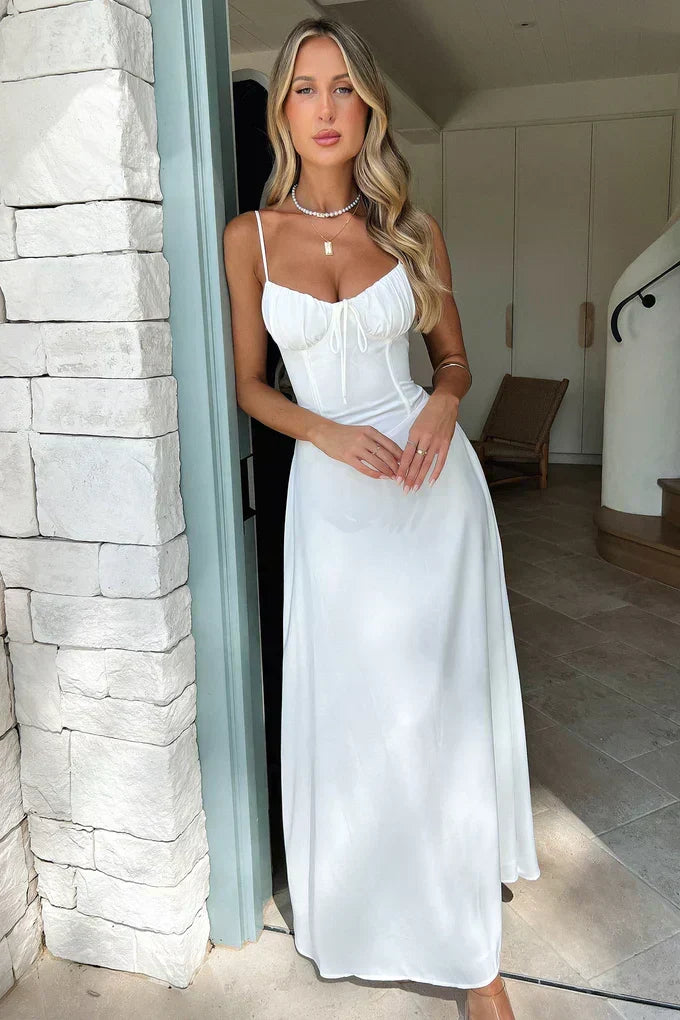 Chic white formal evening gown, a women's sweetheart corset maxi dress for elegant wedding guests.