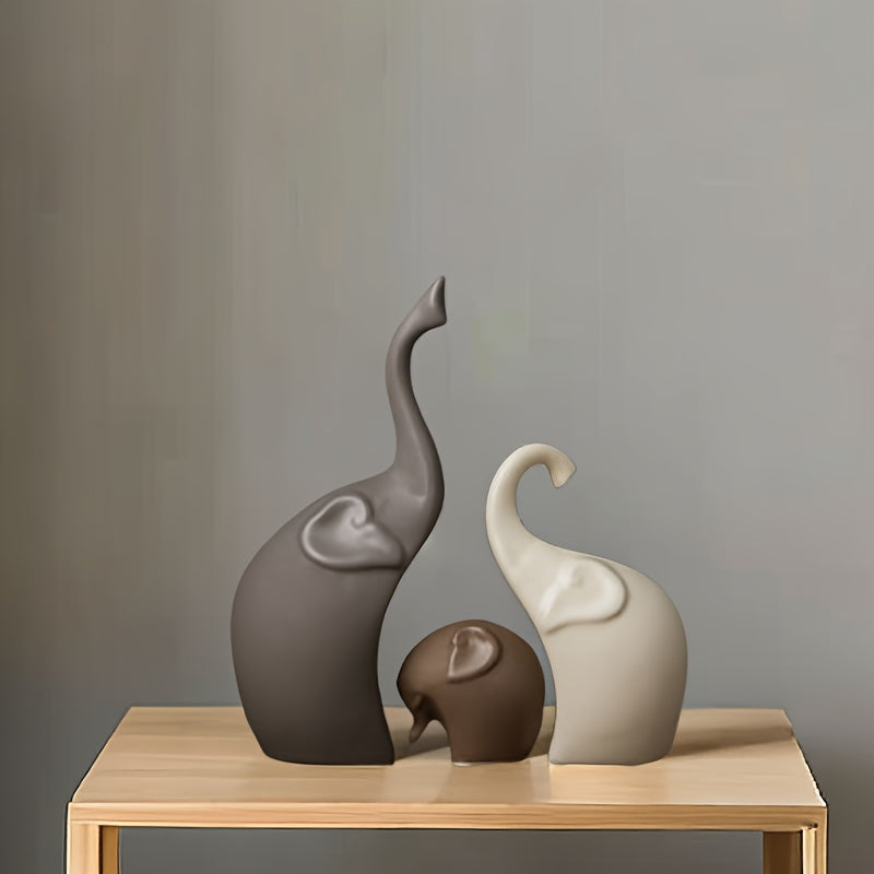 Modern ceramic elephant family trio statues, elegant minimalist home decor figurines. Perfect for living room table.