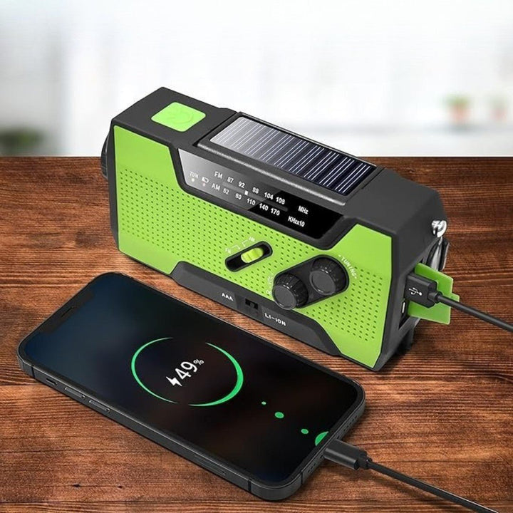 Camping gear essential: hand crank radio with solar charger and power bank for survival