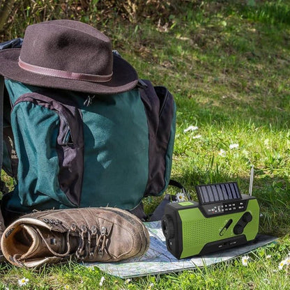 Weather alert radio powered by solar, hand crank, and USB, with a 4000mAh power bank