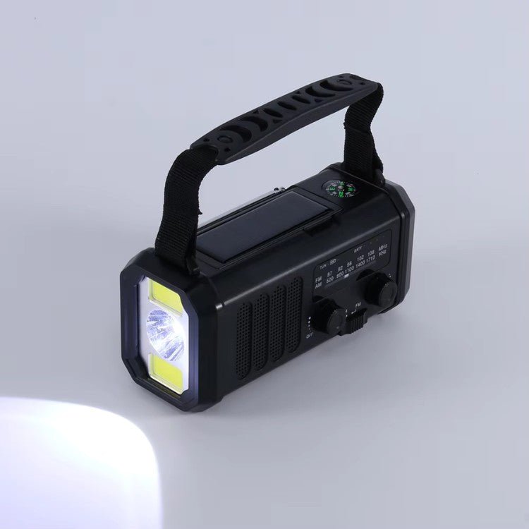 Emergency weather radio with 10000mAh power bank, hand crank, solar charger, and flashlight for survival gear.