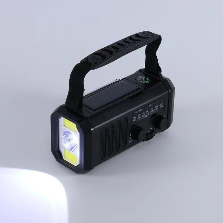 Emergency weather radio with 10000mAh power bank, hand crank, solar charger, and flashlight for survival gear.