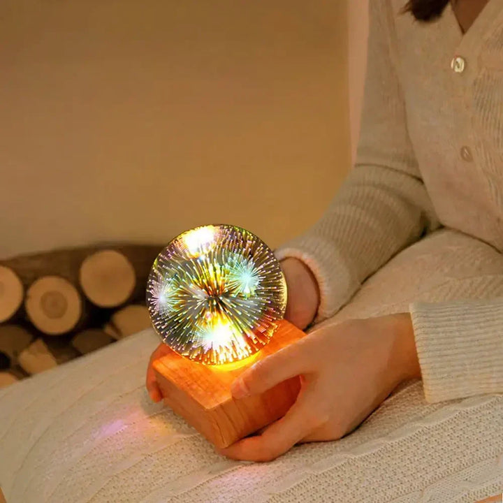 Decorative crystal ball lamp featuring a vibrant 3D firework effect, ideal as a unique night light or home decor piece.