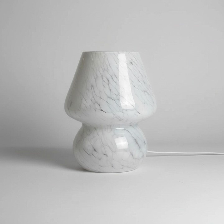 Unique AuraShroom glass mushroom lamp, providing warm mood lighting for any room.