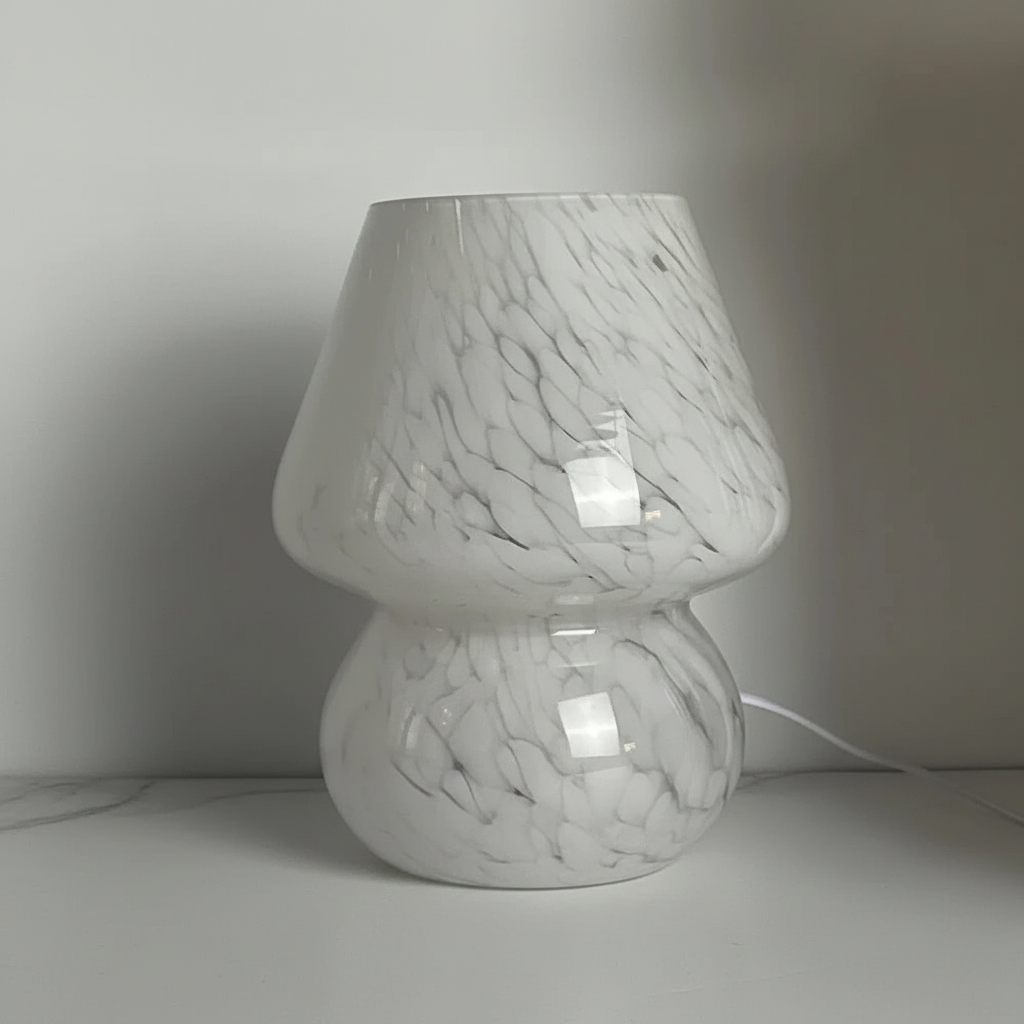 Artistic glass mushroom lamp, a charming home decor piece with soft, cozy lighting.