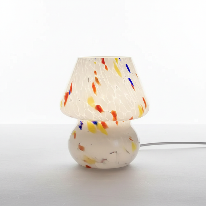 Handcrafted glass mushroom table lamp, unique design & warm mood lighting.