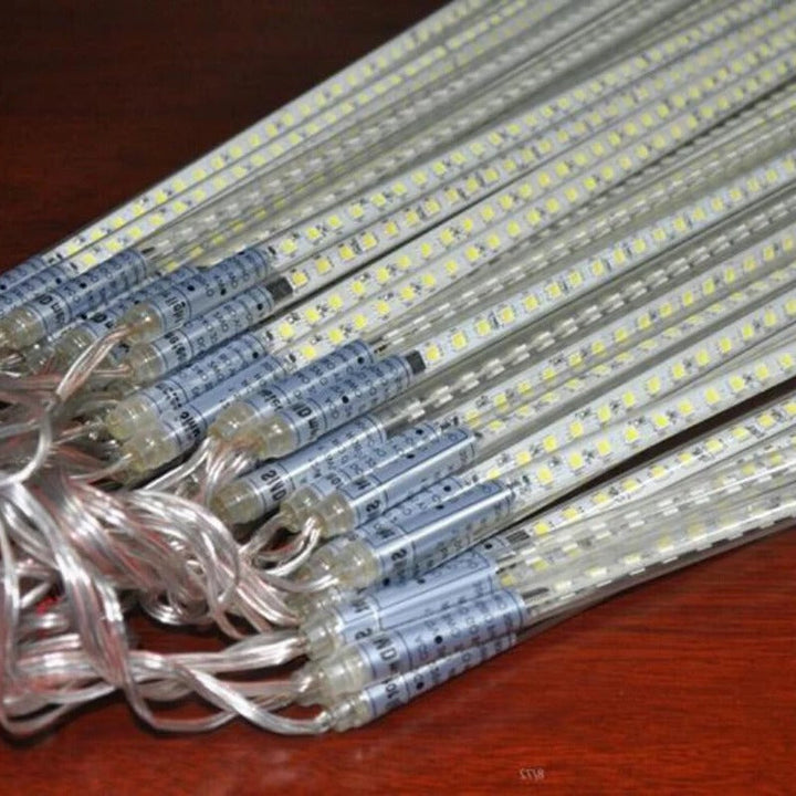 Magical LED snowfall projection lamp, casting beautiful white snowflakes on walls for festive home decor.