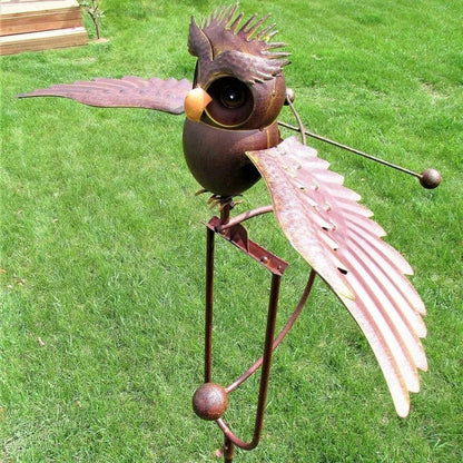 Dynamic eagle bird wind spinner, weather-resistant metal garden art for patio decoration.